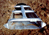 Safety slope end section with cross-drain bars